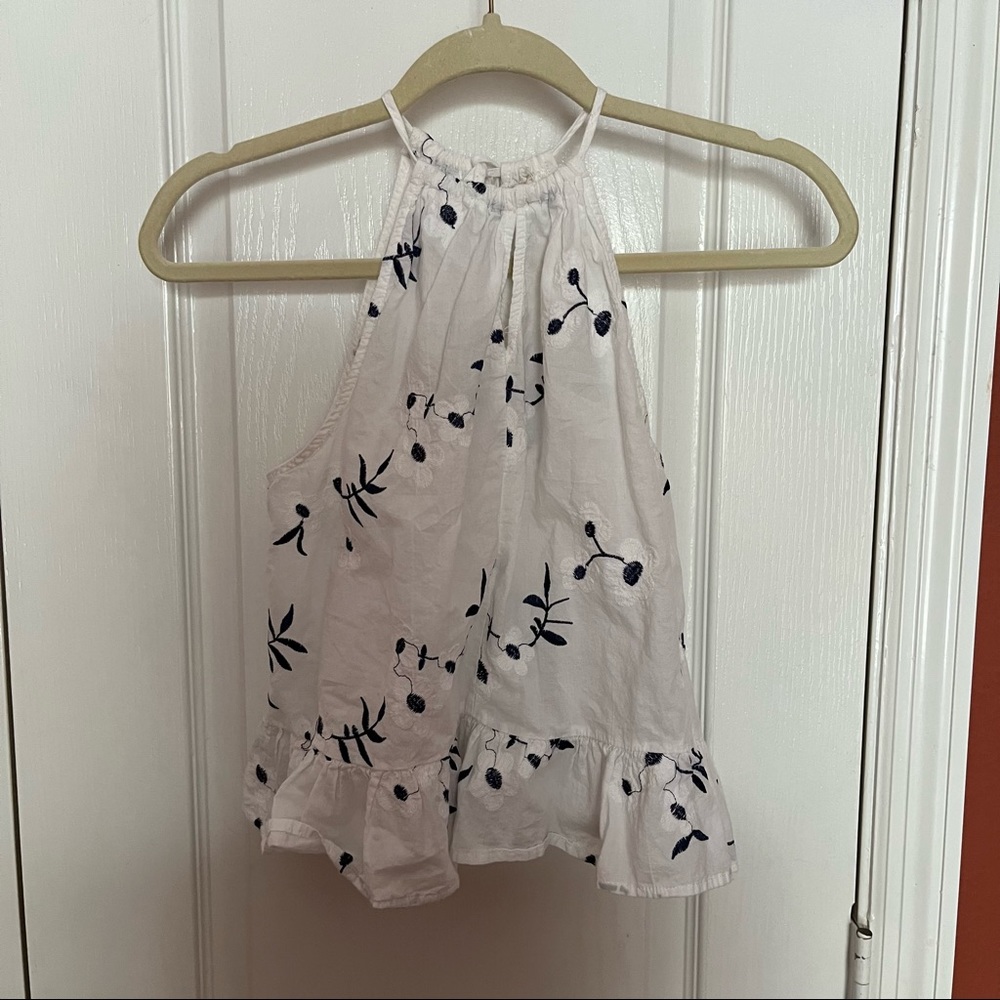 White, high neck, blouse, blue floral detail, key hole cutout, tie up neck